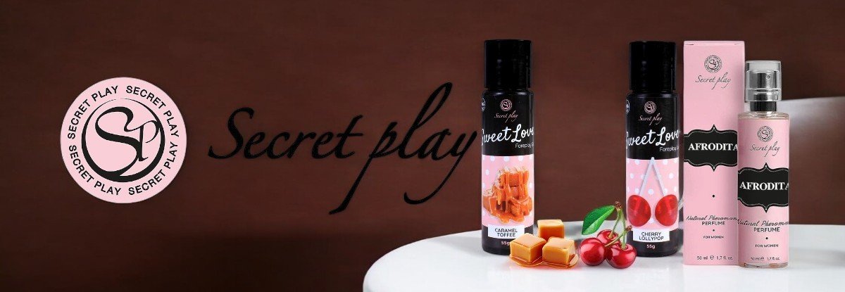 Secret Play Lip Gloss Vibrant Kiss Strawberry Gum Secret Play prekės ženklo puslapio iliustracija
